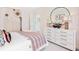 Charming bedroom with white dresser and bohemian decor at 1636 Siloh St # 478, Mount Pleasant, SC 29466