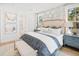 Main bedroom with plush bedding and plenty of natural light at 1636 Siloh St # 478, Mount Pleasant, SC 29466