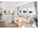 Bright bonus room with a sofa and large windows at 1636 Siloh St # 478, Mount Pleasant, SC 29466