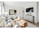 Cozy bonus room with comfortable seating and a large TV at 1636 Siloh St # 478, Mount Pleasant, SC 29466