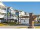 Liberty Hill Farm community entrance sign with new homes in background at 1636 Siloh St # 478, Mount Pleasant, SC 29466