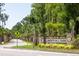 Liberty Hill Farm entrance, lush landscaping, and palm trees line the street at 1636 Siloh St # 478, Mount Pleasant, SC 29466