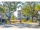 Charming street view of homes with lush landscaping at 1636 Siloh St # 478, Mount Pleasant, SC 29466