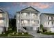Two story home with gray siding and a welcoming front porch at 1636 Siloh St # 478, Mount Pleasant, SC 29466
