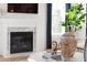 Elegant fireplace with marble surround and modern gas insert at 1636 Siloh St # 478, Mount Pleasant, SC 29466