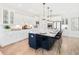 Spacious kitchen with white cabinets, quartz countertops, and a large island at 1636 Siloh St # 478, Mount Pleasant, SC 29466