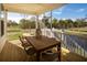 Enjoy outdoor dining on this screened porch overlooking a pond at 1636 Siloh St # 478, Mount Pleasant, SC 29466