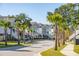Curved street with townhouses and palm trees at 1636 Siloh St # 478, Mount Pleasant, SC 29466