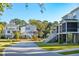 Houses with large porches and lush landscaping at 1636 Siloh St # 478, Mount Pleasant, SC 29466