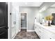 Elegant bathroom with double vanity, large mirror, and a separate shower at 229 Claret Cup Way, Charleston, SC 29414