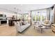 Open concept kitchen with island, stainless steel appliances, and light cabinets at 229 Claret Cup Way, Charleston, SC 29414