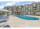Stunning community pool with ample lounge seating, a bar, and scenic views at 252 Cooper River Dr, Mount Pleasant, SC 29464