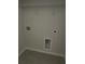 Functional laundry room with wire shelving and hookups at 150 Cantona Dr, Summerville, SC 29483