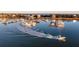 Aerial view of waterfront property with boats and marina at 35 W 9Th Street Ext, Folly Beach, SC 29439