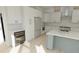Sleek kitchen with stainless steel appliances and wine storage at 35 W 9Th Street Ext, Folly Beach, SC 29439