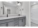 Modern bathroom with double vanity and gray cabinets at 474 Green Fern Dr, Summerville, SC 29483