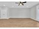 Large living room with hardwood floors and ceiling fan at 474 Green Fern Dr, Summerville, SC 29483