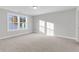 Bright bedroom featuring neutral walls, carpet flooring, and a large window at 134 Cantona Dr, Summerville, SC 29483