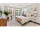 Main bedroom with a king-size bed, ample natural light, and a sitting area at 134 Cantona Dr, Summerville, SC 29483