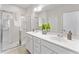 Bathroom boasts double sinks, a large mirror, and a walk-in shower at 418 Queenview Ln, Charleston, SC 29414