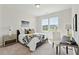 Bright bedroom with double windows, carpet, and built-in workspace at 418 Queenview Ln, Charleston, SC 29414