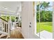 Bright entryway with hardwood floors and view to living room at 418 Queenview Ln, Charleston, SC 29414