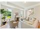 Living room with hardwood floors, neutral decor, and staircase at 418 Queenview Ln, Charleston, SC 29414