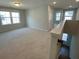 Neutral-colored upstairs loft space with natural lighting at 479 Green Fern Dr, Summerville, SC 29483