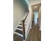 Staircase with wood treads and white risers leads to additional living space at 479 Green Fern Dr, Summerville, SC 29483