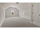 Spacious bonus room with vaulted ceiling and neutral carpeting at 379 Wappoo Trace Ln, Summerville, SC 29486