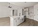 Modern kitchen with farmhouse sink, stainless steel appliances, and white shaker cabinets at 379 Wappoo Trace Ln, Summerville, SC 29486