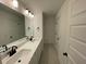 Modern bathroom with double vanity and updated fixtures at 537 Rendezvous Way, Huger, SC 29450