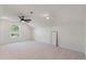 Spacious, carpeted bonus room features natural light, ceiling fan, and recessed lighting at 111 Ashley Cove Way, Summerville, SC 29483