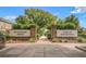 A welcoming Hutchinson Square and Town of Summerville community entrance with brick signage and landscaped pathway at 111 Ashley Cove Way, Summerville, SC 29483