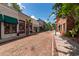 Charming downtown street view with brick road and unique storefronts, perfect for a leisurely stroll and shopping at 111 Ashley Cove Way, Summerville, SC 29483