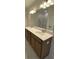 Bathroom featuring a dual sink vanity with a walk-in shower in background at 502 Fiskdale Cir, Summerville, SC 29486