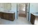 Bathroom featuring double vanity with white counters and wood cabinetry at 502 Fiskdale Cir, Summerville, SC 29486