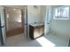 Bathroom with light-colored tile and wood vanity at 502 Fiskdale Cir, Summerville, SC 29486