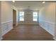 Dining room featuring chair rail molding and decorative lighting at 502 Fiskdale Cir, Summerville, SC 29486