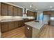 Modern kitchen with granite countertops, stainless steel appliances, and a center island at 502 Fiskdale Cir, Summerville, SC 29486