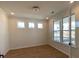 Bright living room featuring hardwood floors and large windows for natural light at 502 Fiskdale Cir, Summerville, SC 29486