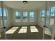 Bright living room featuring hardwood floors and large windows for natural light at 502 Fiskdale Cir, Summerville, SC 29486