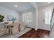 Bright dining room with hardwood floors, a wooden table, and neutral decor at 208 Cherry Grove Dr, Summerville, SC 29483