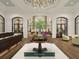 Elegant lobby with high ceilings and a grand chandelier at 609 King St # 701, Charleston, SC 29403