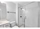 Bathroom with vanity, toilet, and tiled walk-in shower with frameless glass door at 710 Maynard Ln, Summerville, SC 29486
