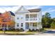 Two-story house with gray siding, front porch, and landscaped yard at 130 Cantona Dr, Summerville, SC 29483