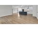Open concept kitchen with a large island and light hardwood floors at 130 Cantona Dr, Summerville, SC 29483
