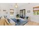 Cozy living room featuring a comfortable sofa and access to a patio at 130 Cantona Dr, Summerville, SC 29483