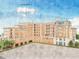 Multi-unit building with brick exterior, balconies, and parking at 609 King St # 715, Charleston, SC 29403