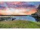 Enjoy scenic waterfront views from this property, complete with a private dock and tranquil surroundings at 6240 Old Point Rd # C14, Hanahan, SC 29410